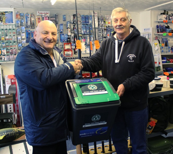 WSB general manager Mario (left) delivering one of the ANLRS bins to Camborne Tackle owner Graham