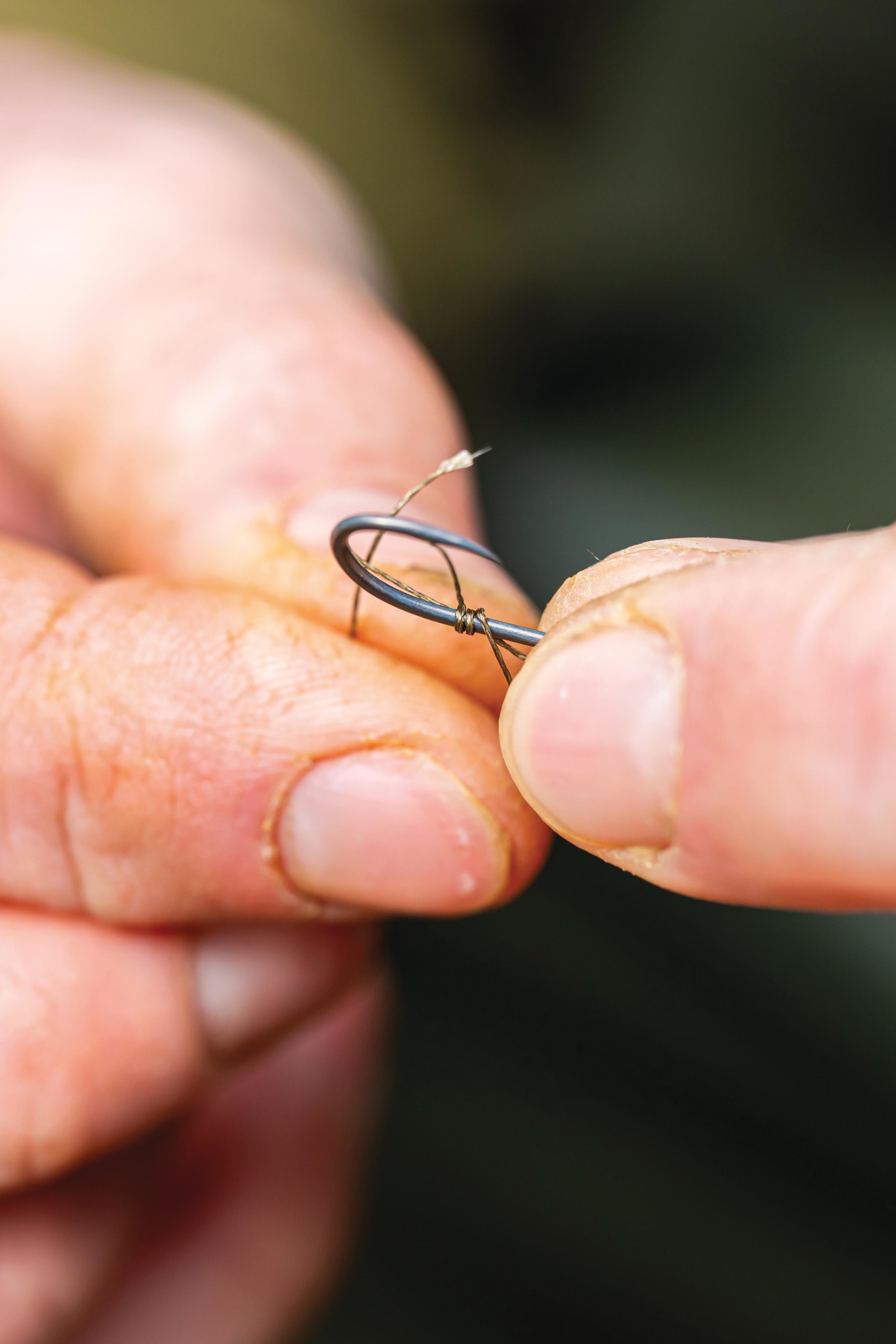 Whip the braid around the hook shank three times.