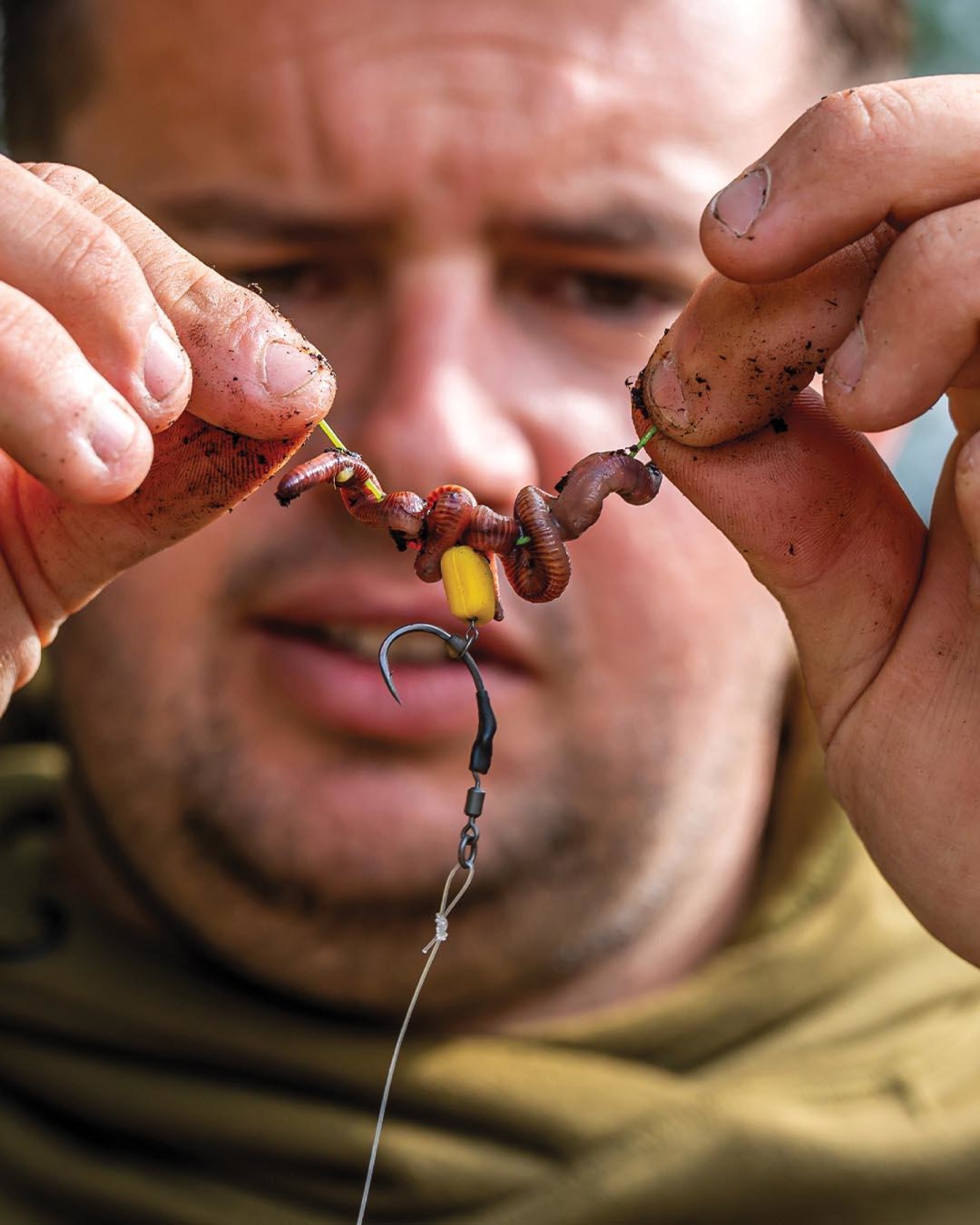 6. Pass one worm onto each elastic tag end.